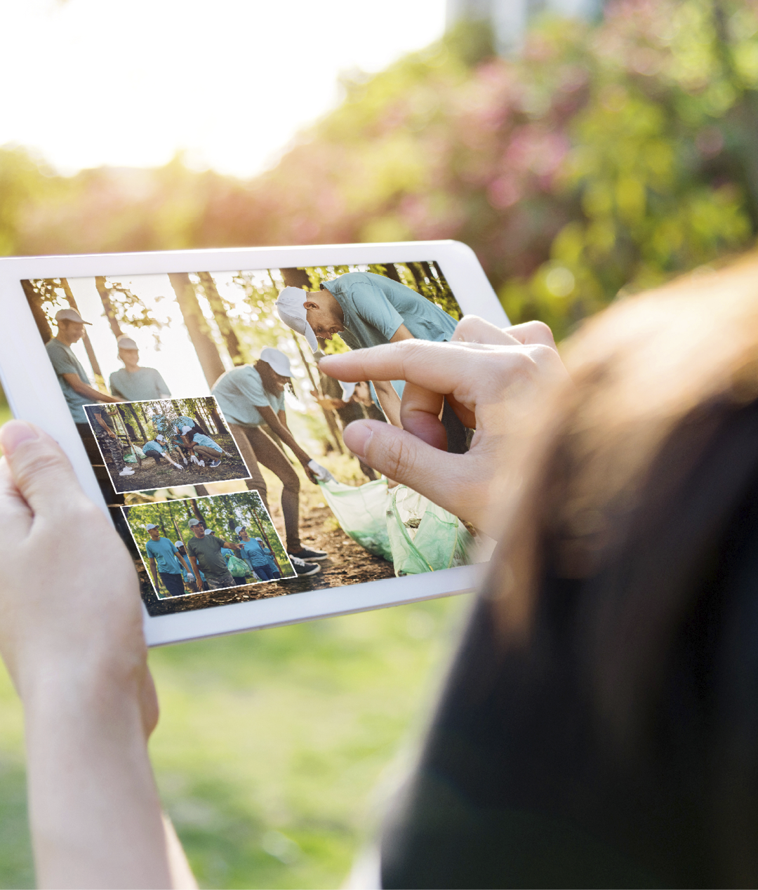 Woman hand using a digital tablet outdoors 